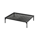 Elevated breathable mesh pet bed raised off the ground for airflow