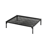 Elevated breathable mesh pet bed raised off the ground for airflow