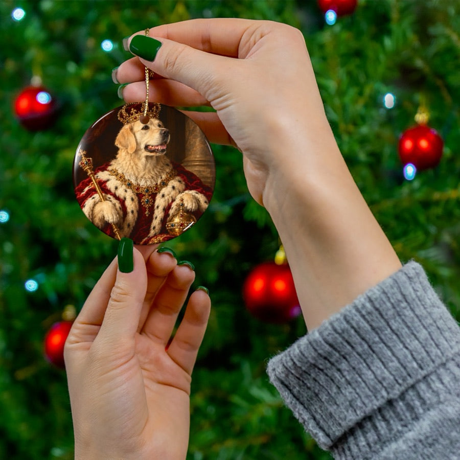 Round pet portrait ornament hanging on a Christmas tree