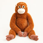 Punch Monkey orangutan plush sitting, front view